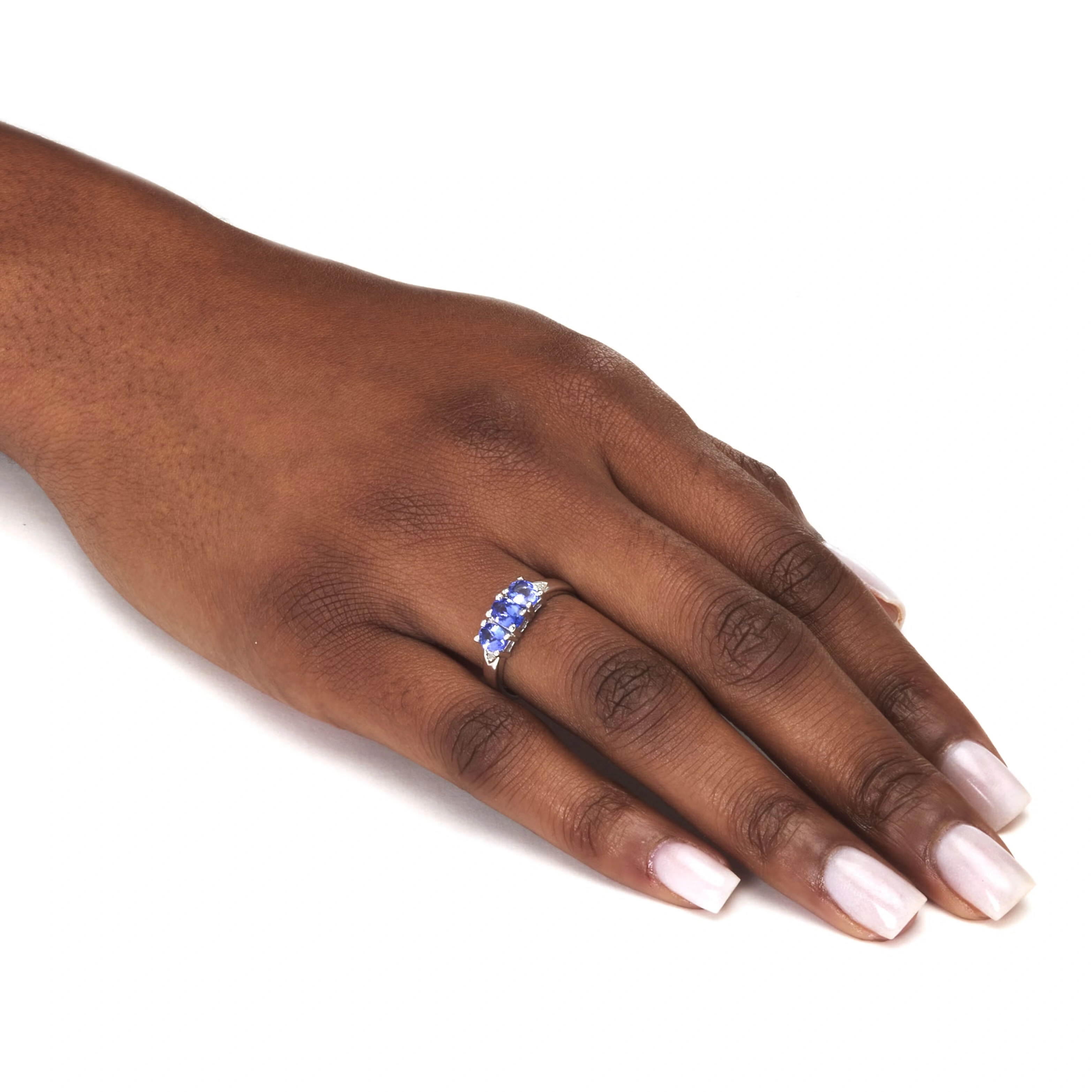 .89 TCW Genuine Purple Tanzanite and Diamond Accent Sterling Silver 3-Stone Ring 3 .89 TCW Genuine Purple Tanzanite and Diamond Accent Sterling Silver 3-Stone Ring